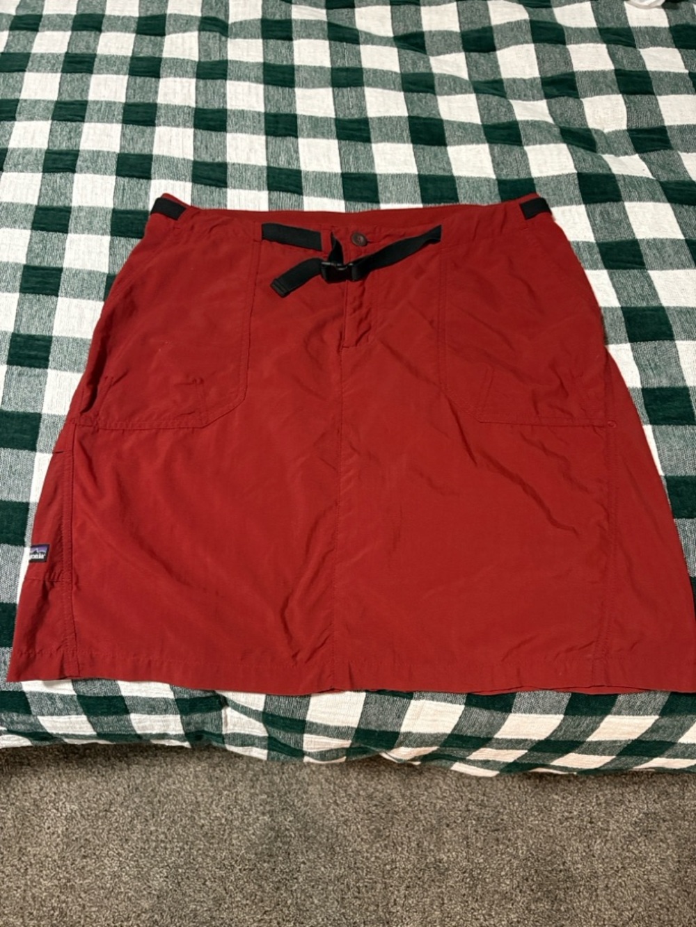 Patagonia Red rust skirt for hiking with black belt